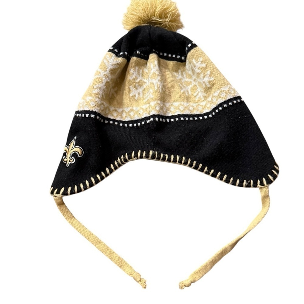 NFL Team Apparel beanie with Pom & Fleur de Lis  on side. One size Unisex